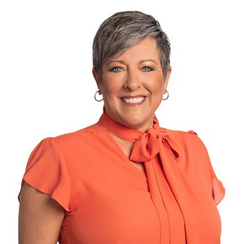 Portrait of Nikki Phillips, VP, Real Estate Services.